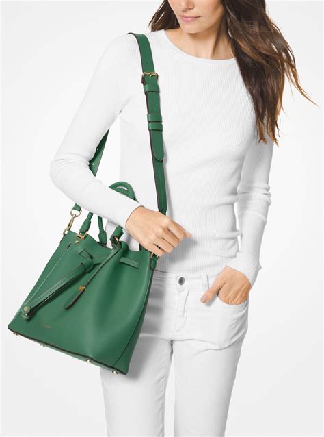 michael michael kors blakely medium leather bucket bag green|Michael Kors drawstring bucket bag.